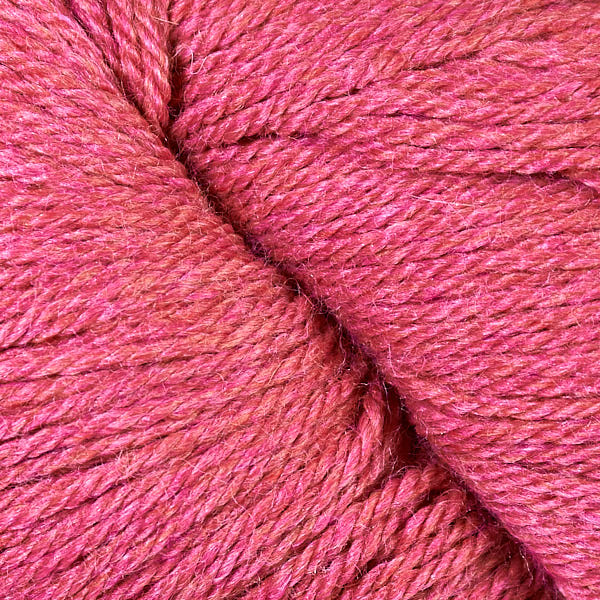 Close-up of coral pink heathered yarn 