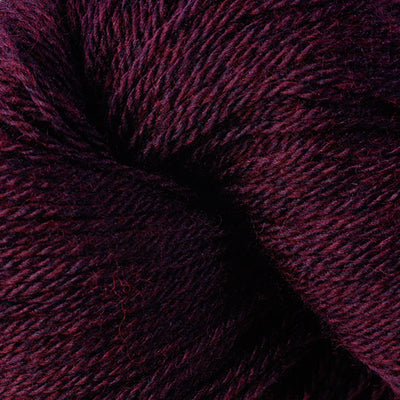 Close-up of a skein of dark burgundy yarn