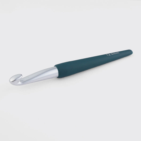 Dark Green crochet hook on a light gray background