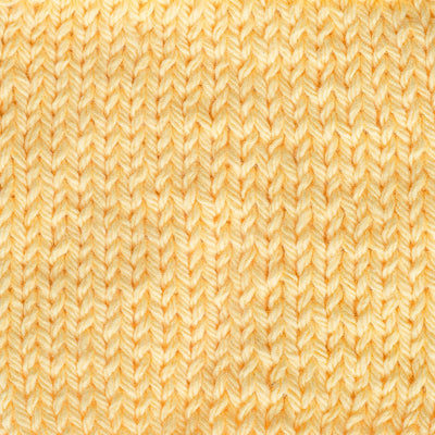 Close-up of a textured yellow fabric pattern